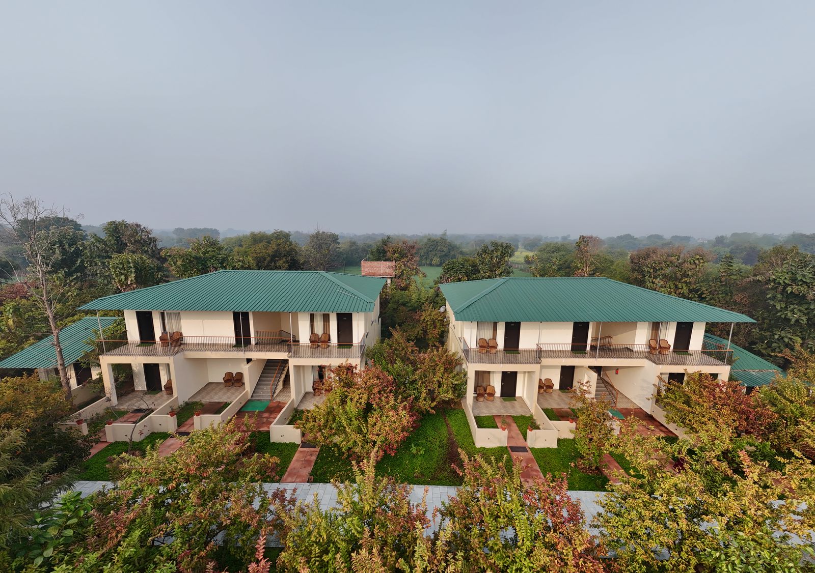 Aerial view of a resort villa property amid greenery